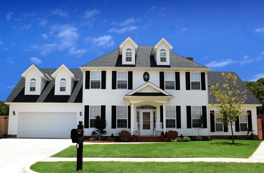 Builder discussing floor plan with homeowner during granny flat construction project