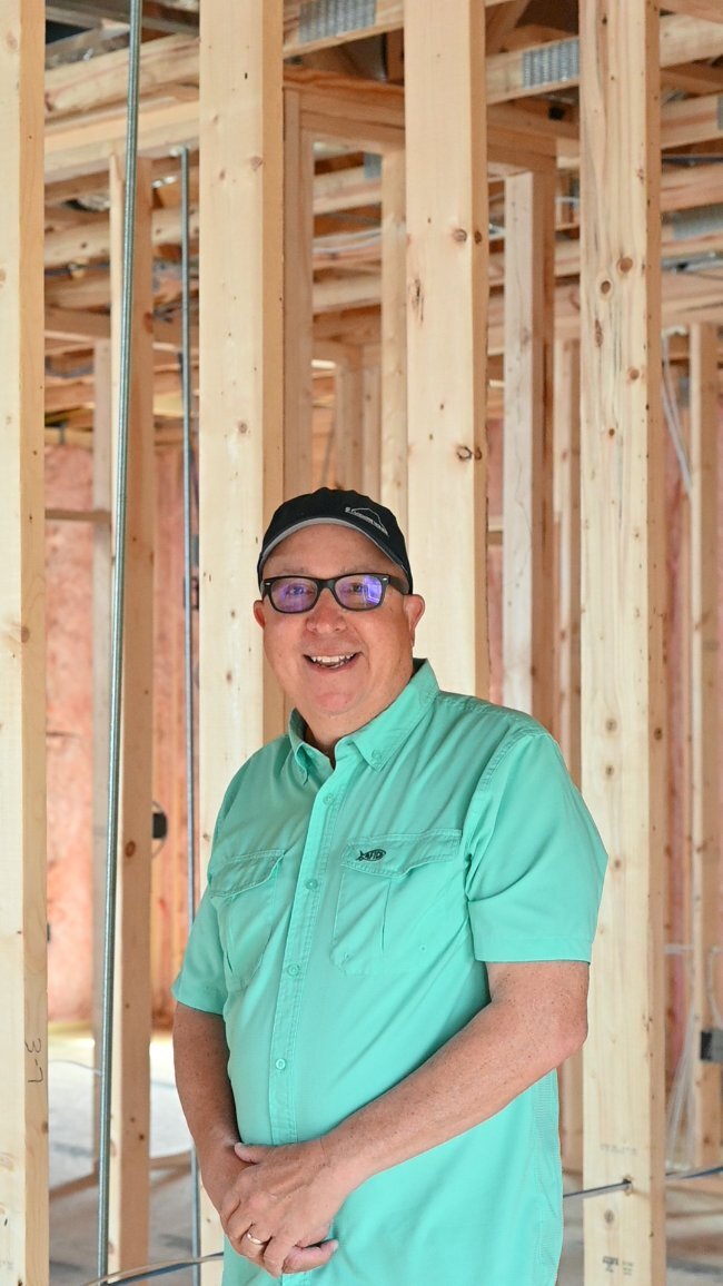 Dennis Remesch construction expert inside framed custom home by EZ Modern Homes Pensacola FL-optimized