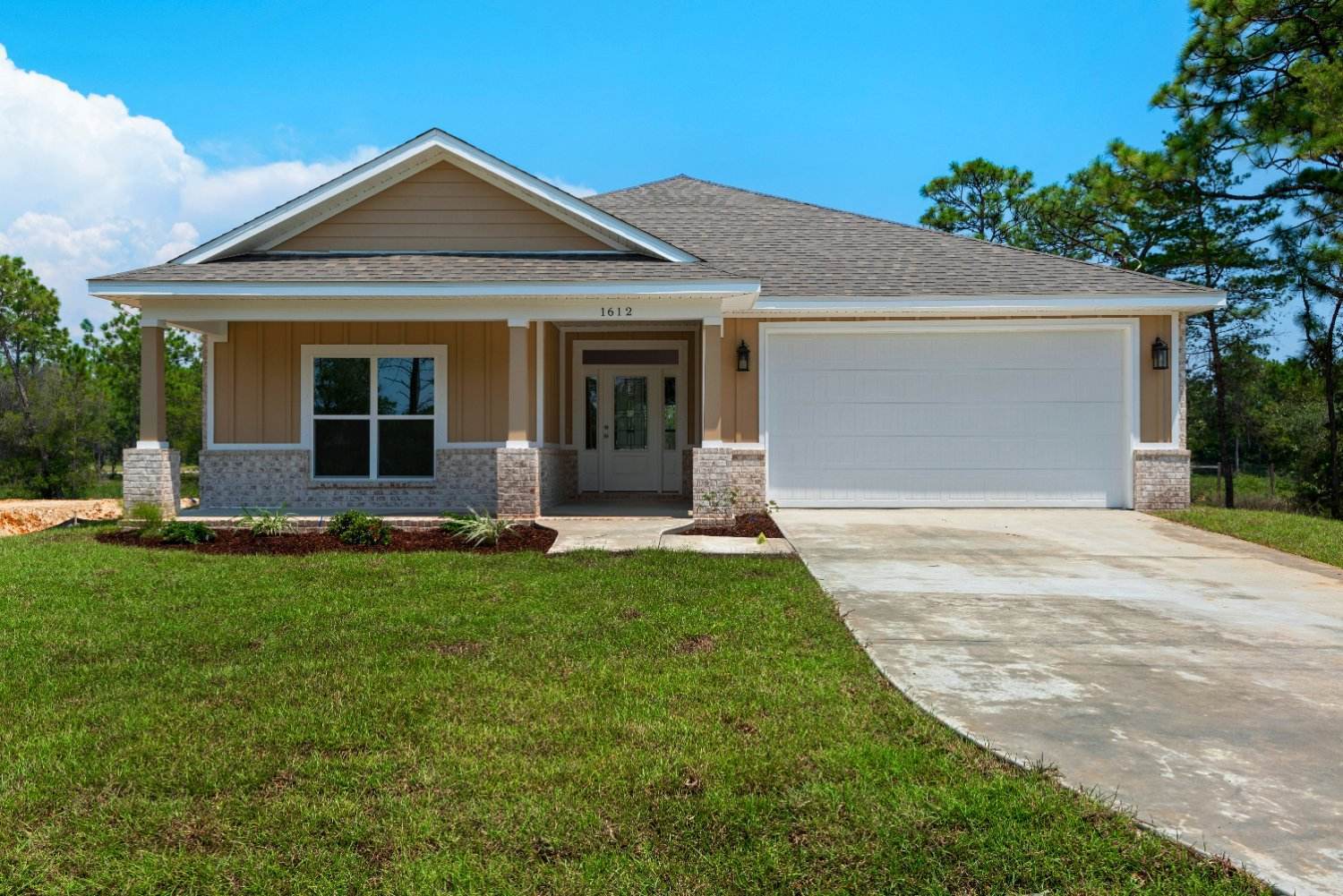 front exterior of custom home The Poderosa by EZ Modern Homes in Pensacola FL-optimized-optimized