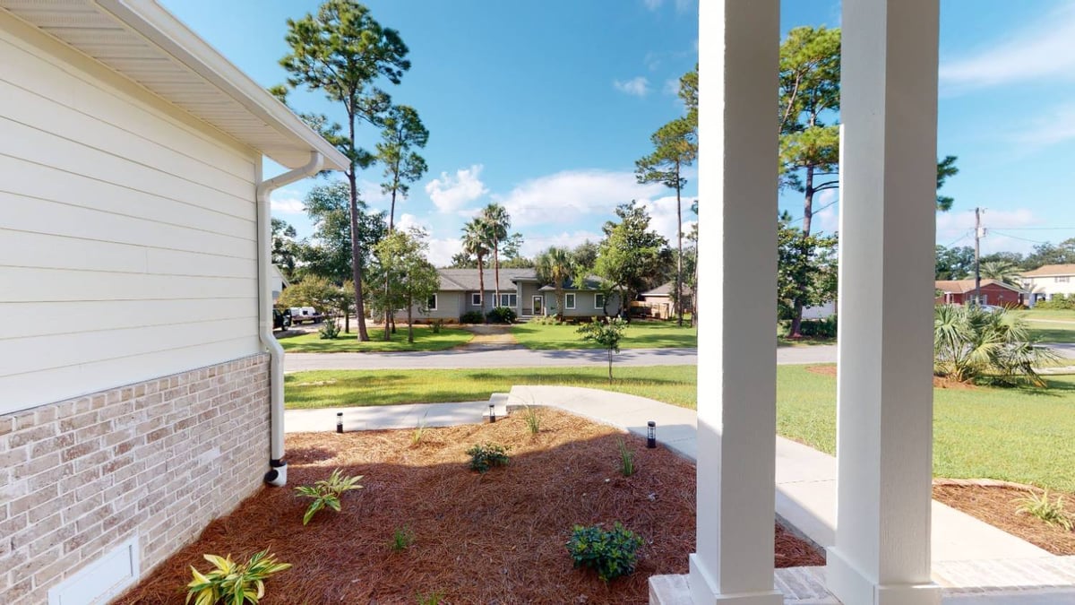 Front yard perspective from The Lafon custom home porch by EZ Modern Homes in Pensacola, FL-optimized
