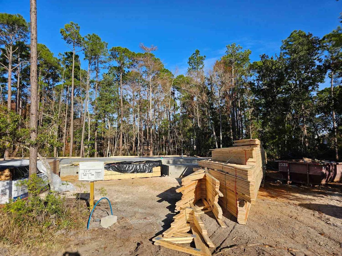 EZ Modern Homes custom home foundation and lumber delivery in Pensacola FL for The Lafon project-optimized-optimized