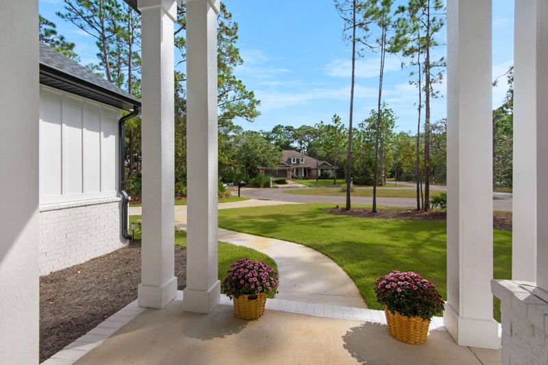 custom home porch view of lawn and surrounding neighborhood by EZ Modern Homes Pensacola FL The Lafon-optimized