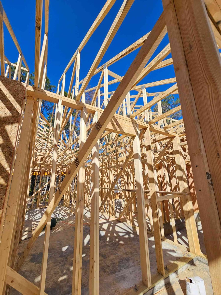 wood framing and ceiling trusses inside custom home by EZ Modern Homes Pensacola FL The Lafon-optimized-optimized