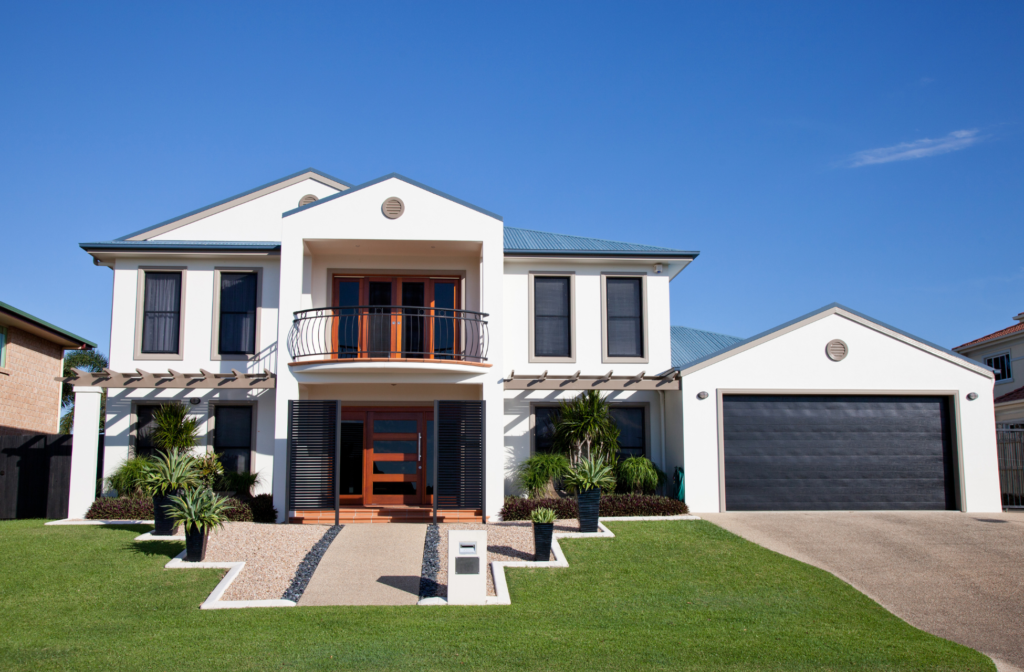 Modern custom home exterior in Pensacola with large windows and clean architectural lines