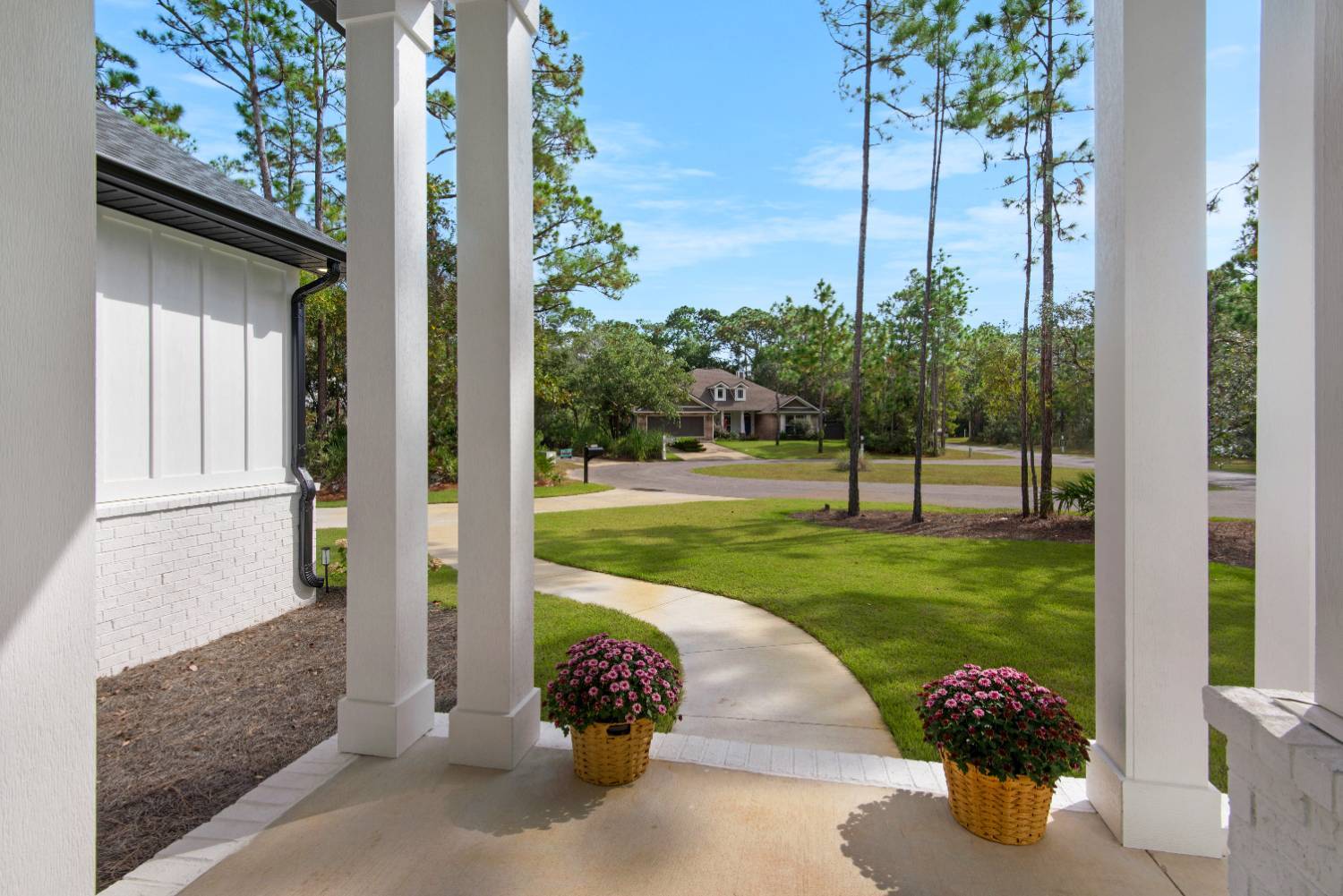 custom home porch view of lawn and surrounding neighborhood by EZ Modern Homes Pensacola FL The Lafon-optimized