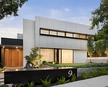 Builder discussing layout plans for a Pensacola backyard guest house